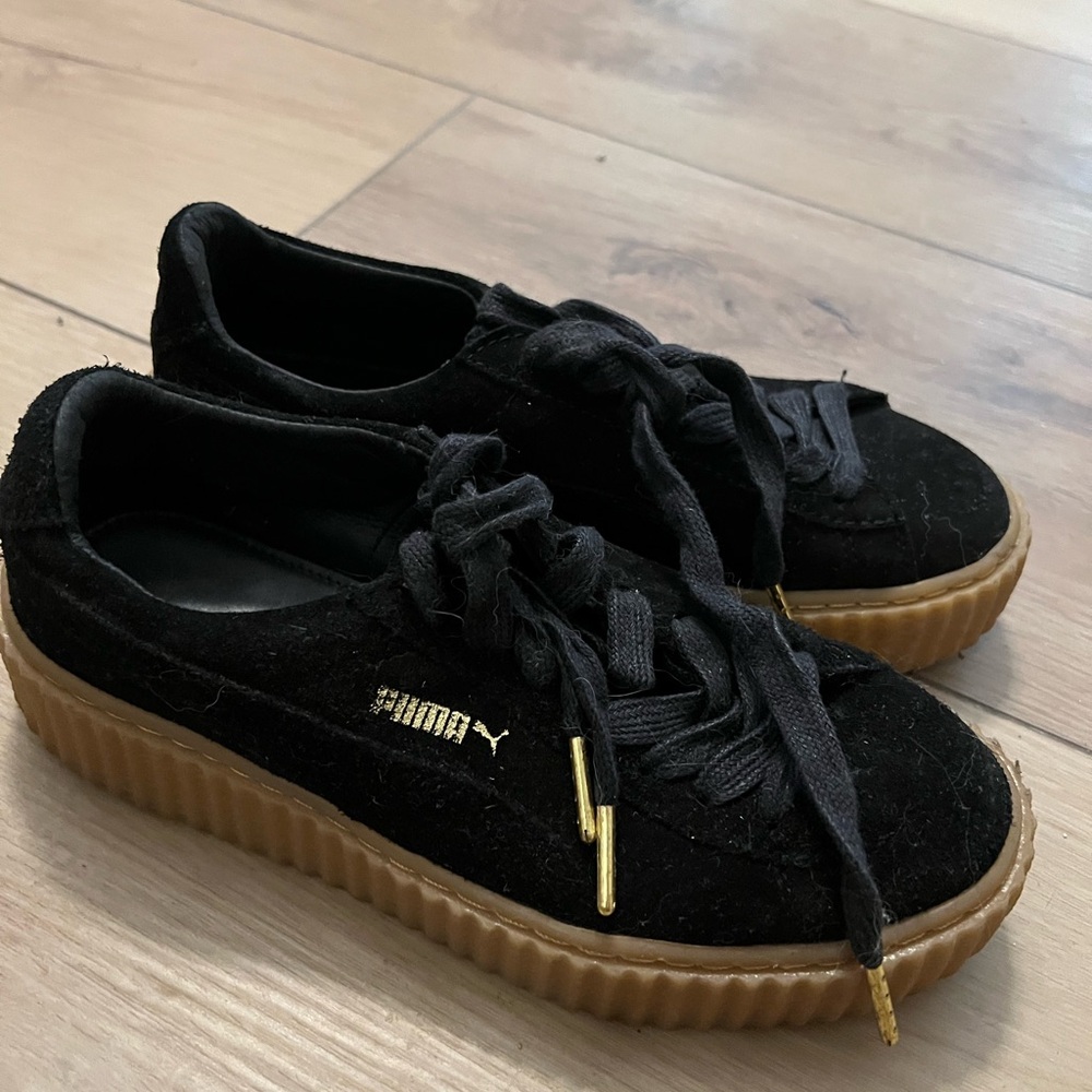 Puma Rihanna Black Sneakers with Gum Sole and Gold Details